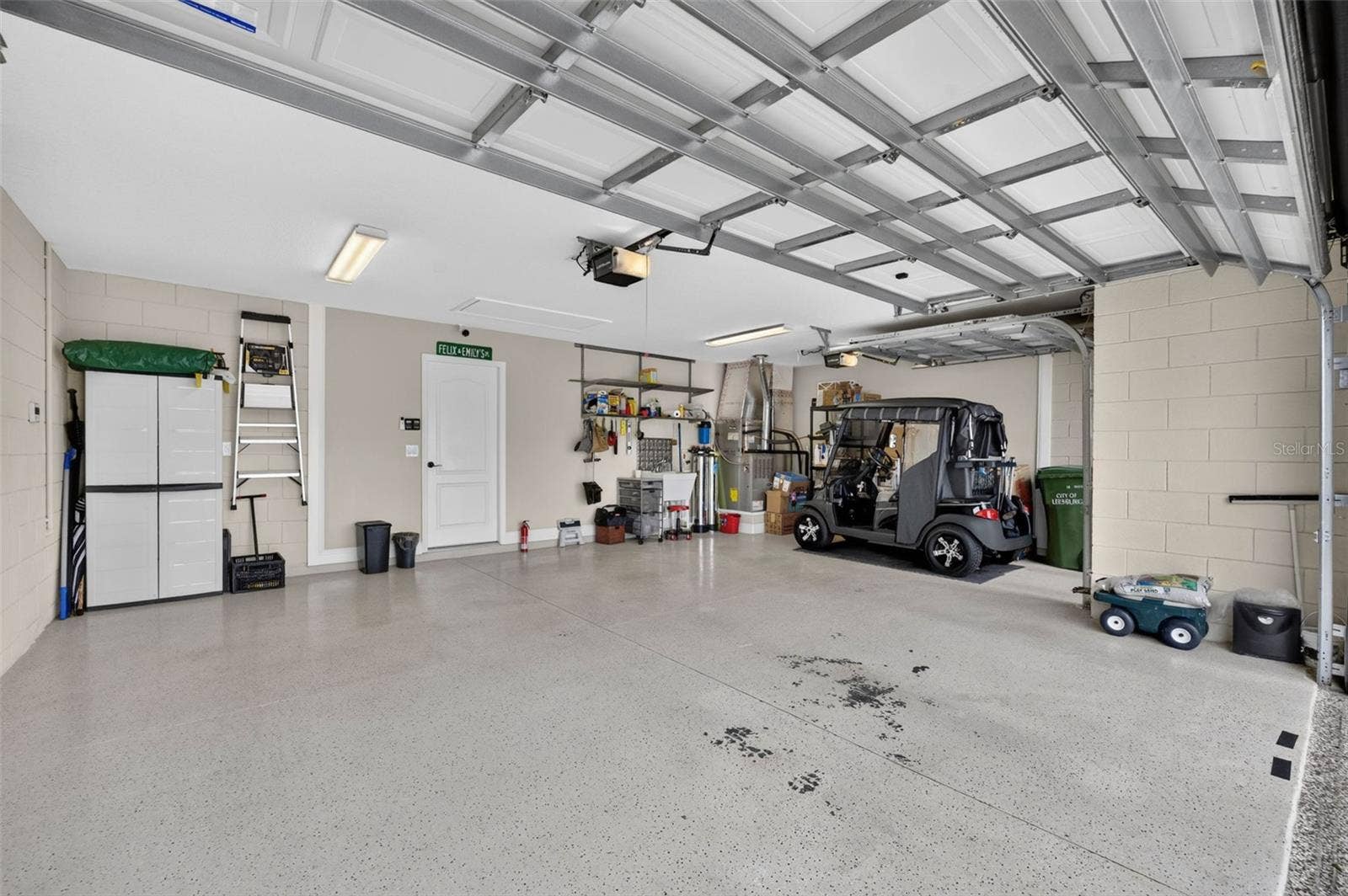 3749 ARLINGTON RIDGE BOULEVARD, Leesburg, FL 34748 2 car w/golf cart garage