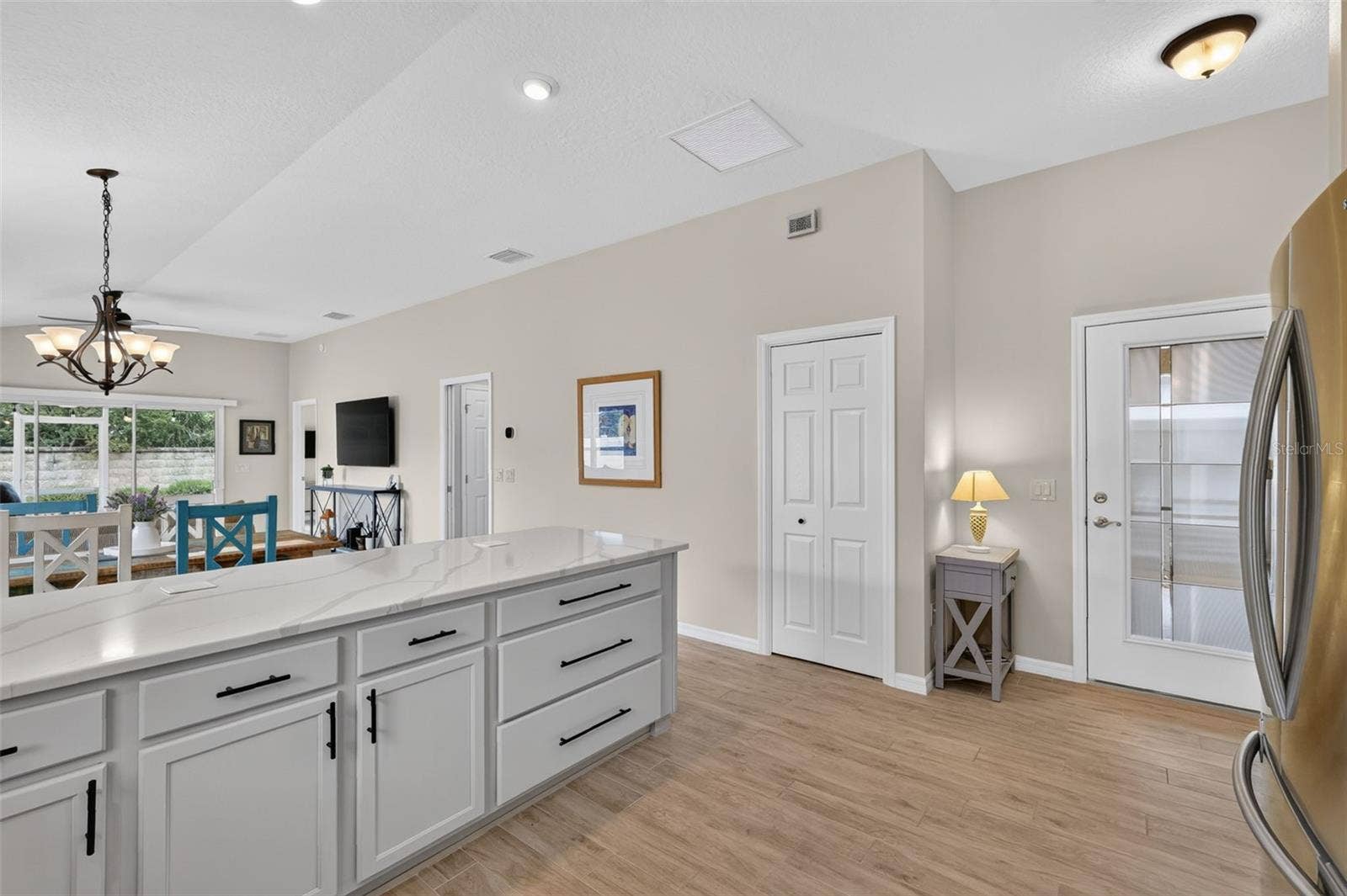 3435 ALLISON PLACE, The Villages, FL 32163 Front Door - View from the Kitchen