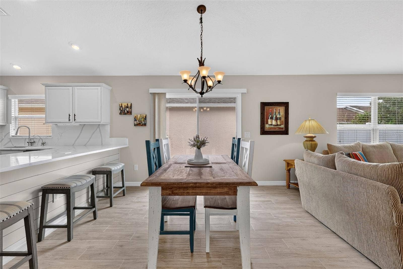3435 ALLISON PLACE, The Villages, FL 32163 Dining Room with Sliding Doors to the Side Patio