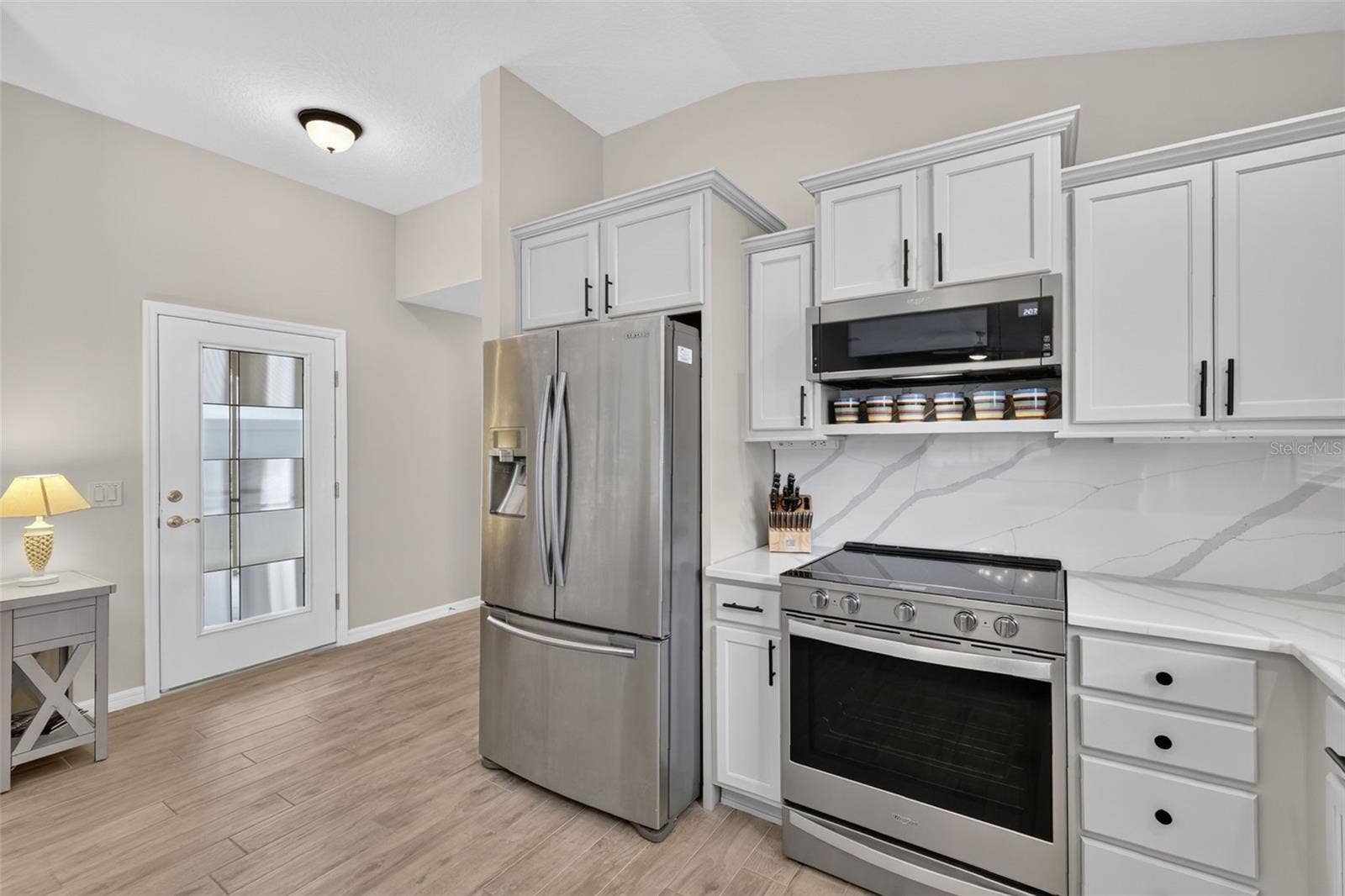 3435 ALLISON PLACE, The Villages, FL 32163 Front door with hallway to the 3rd Bedroom, Laundry Room and Garage
