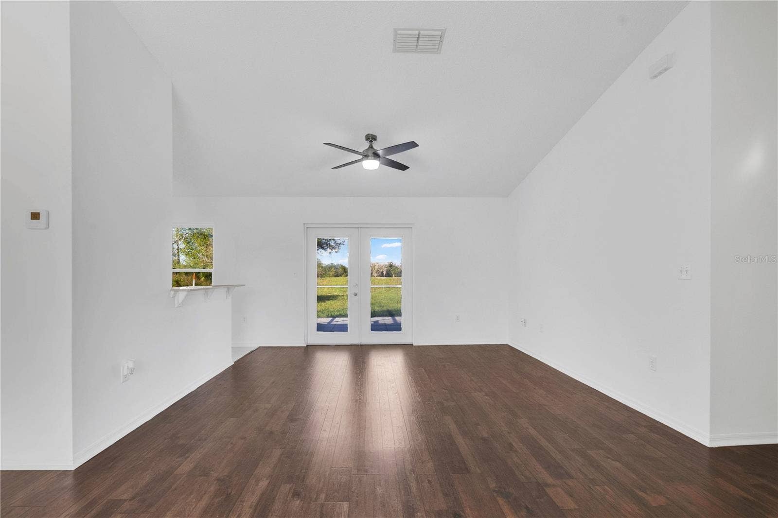 15741 GREATER GROVES BOULEVARD, Clermont, FL 34714 Living Room from the front door