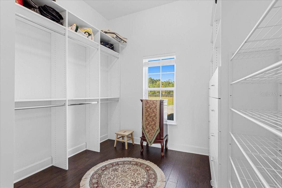 10401 NW 153RD TERRACE, Alachua, FL 32615 Primary bedroom walk-in closet