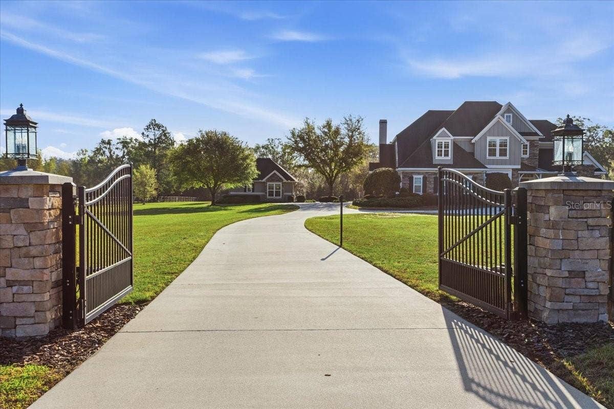 10401 NW 153RD TERRACE, Alachua, FL 32615 Double-gated estate home. Red Oaks Estates offers a gated community plus this residence has its own beautiful gate.