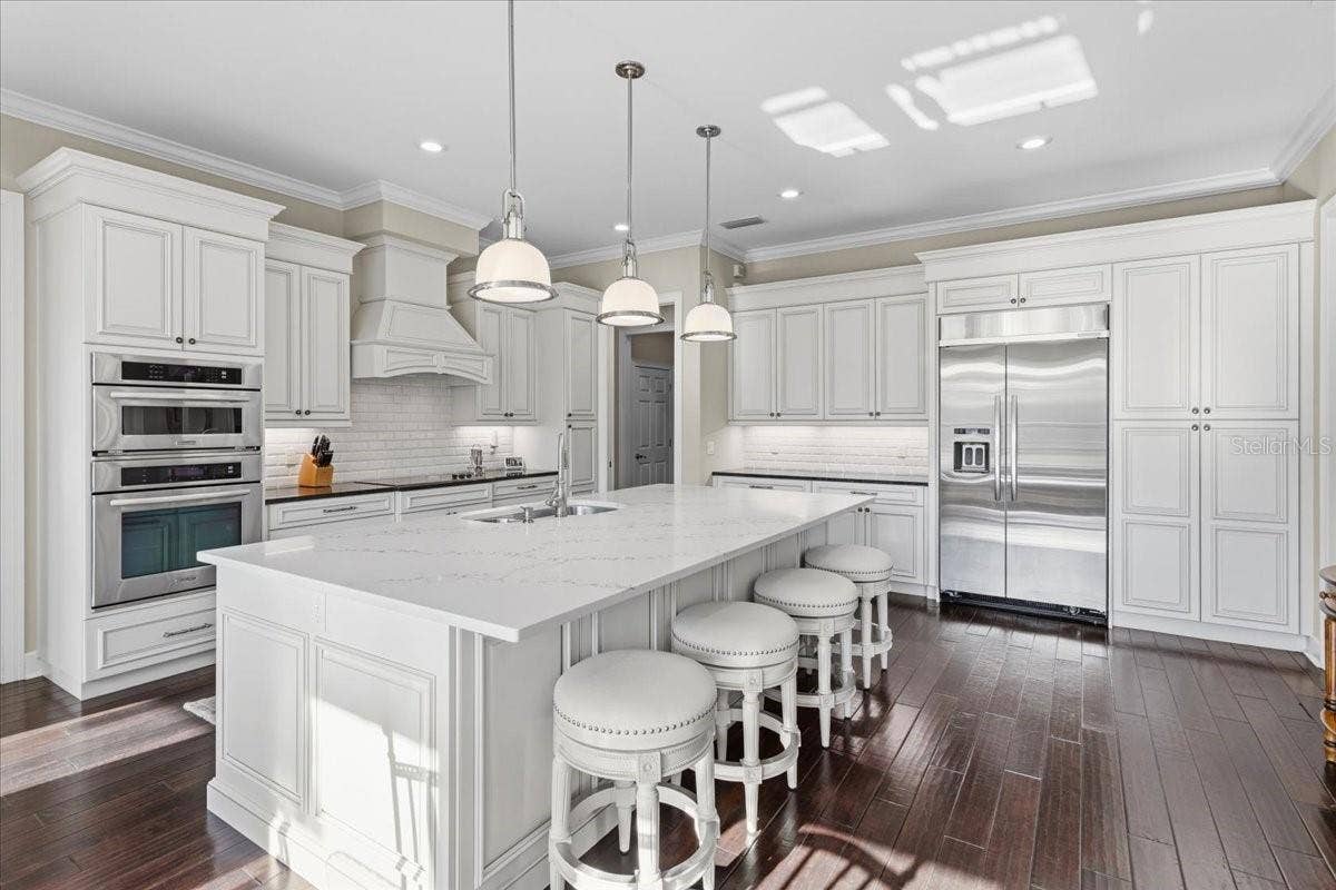 10401 NW 153RD TERRACE, Alachua, FL 32615 Range is plumbed for gas if buyer prefers a gas range.