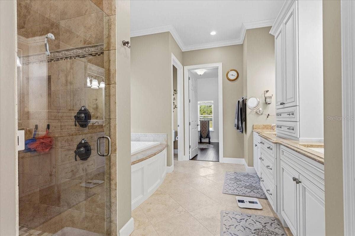 10401 NW 153RD TERRACE, Alachua, FL 32615 Primary bathroom en suite (downstairs)