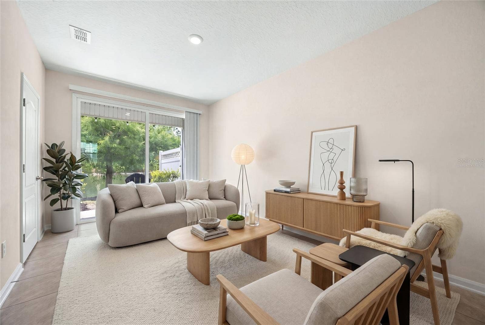 585 RUNNING WOODS STREET, Orange Park, FL 32065 virtually staged great room