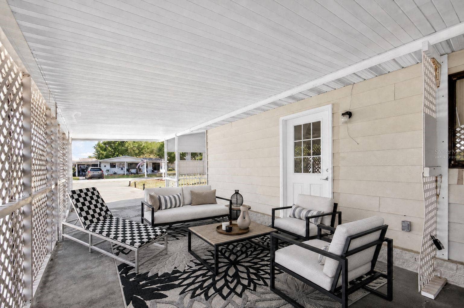 8972 SW 103RD LANE, Ocala, FL 34481 Carport Virtually Staged
