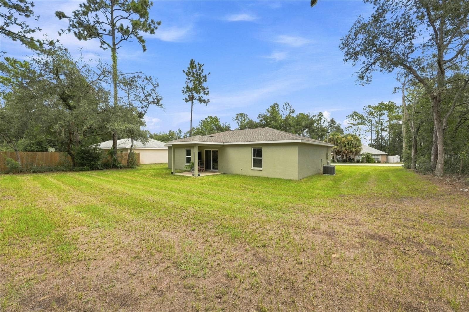 7390 N IRELAND DRIVE, Dunnellon, FL 34434 Back of Home