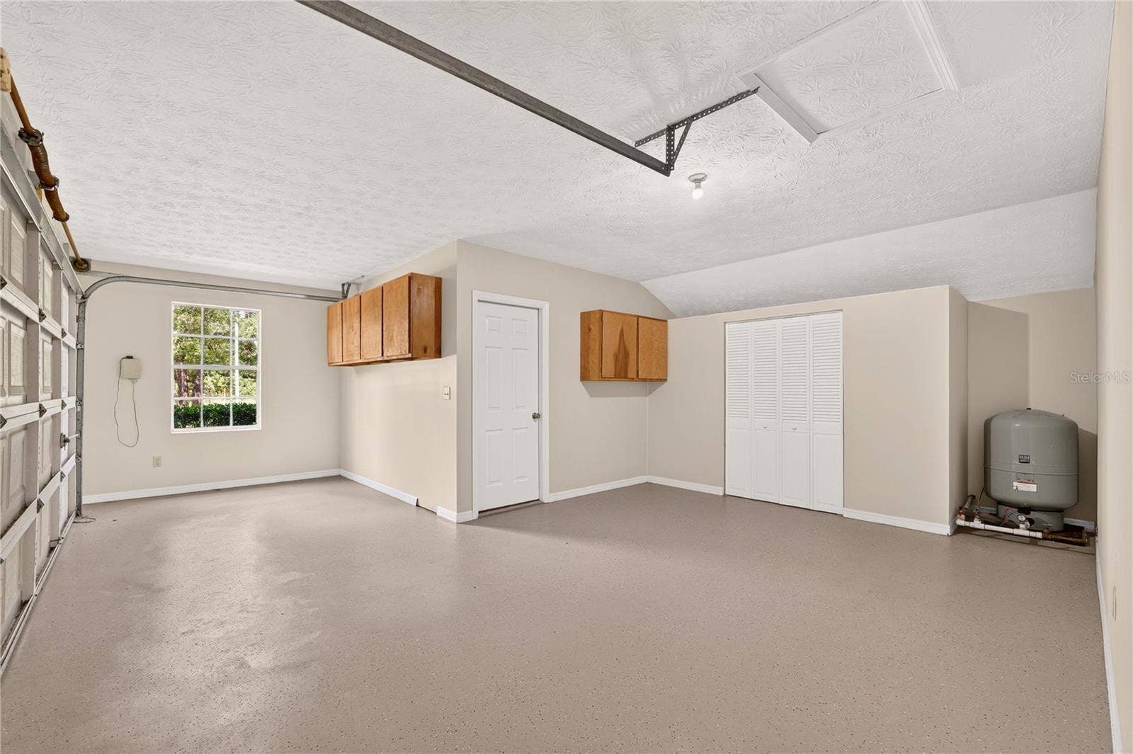 2 car garage with bonus/office taking up one corner