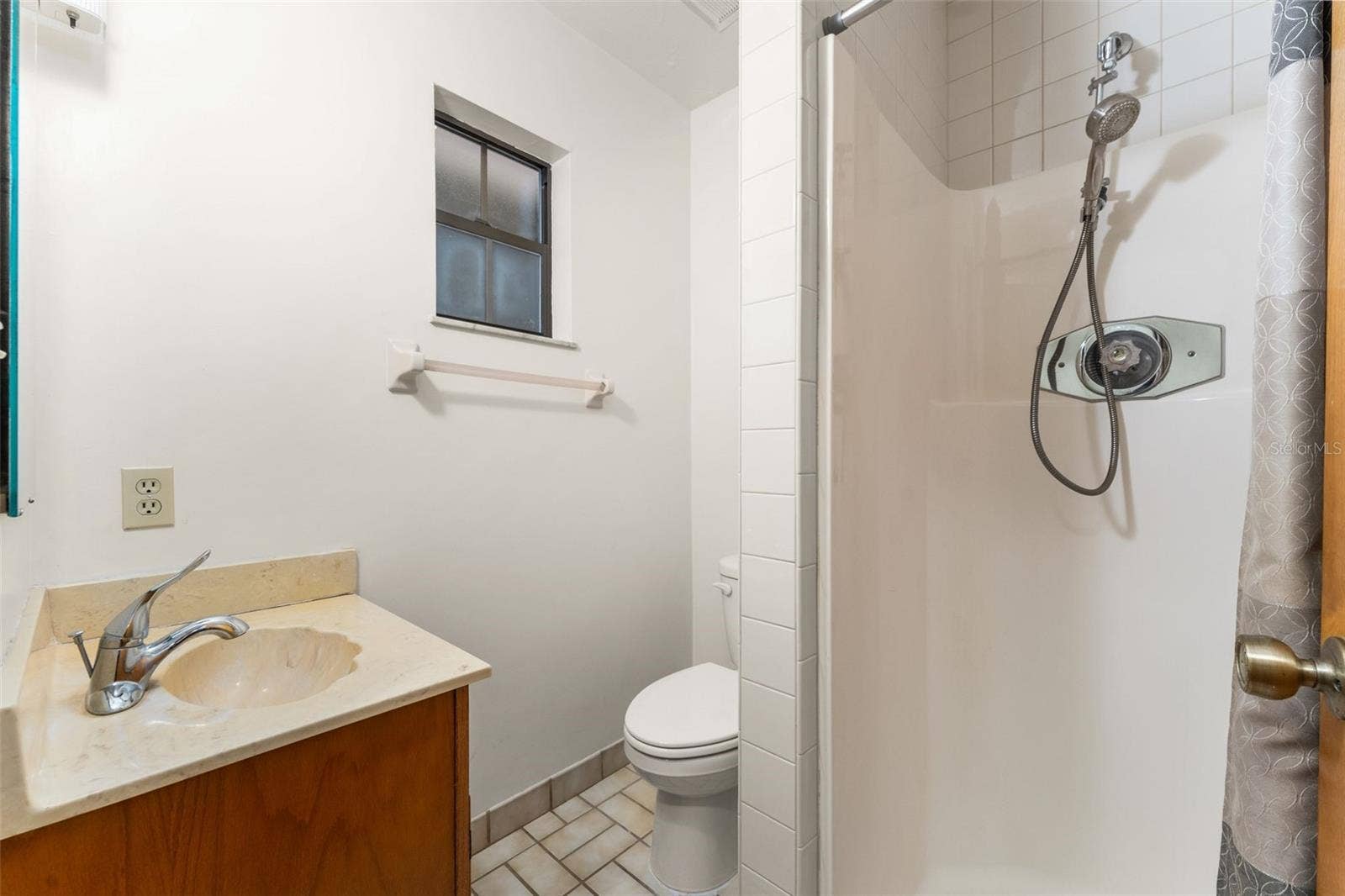 3rd Bathroom, just inside from the garage
