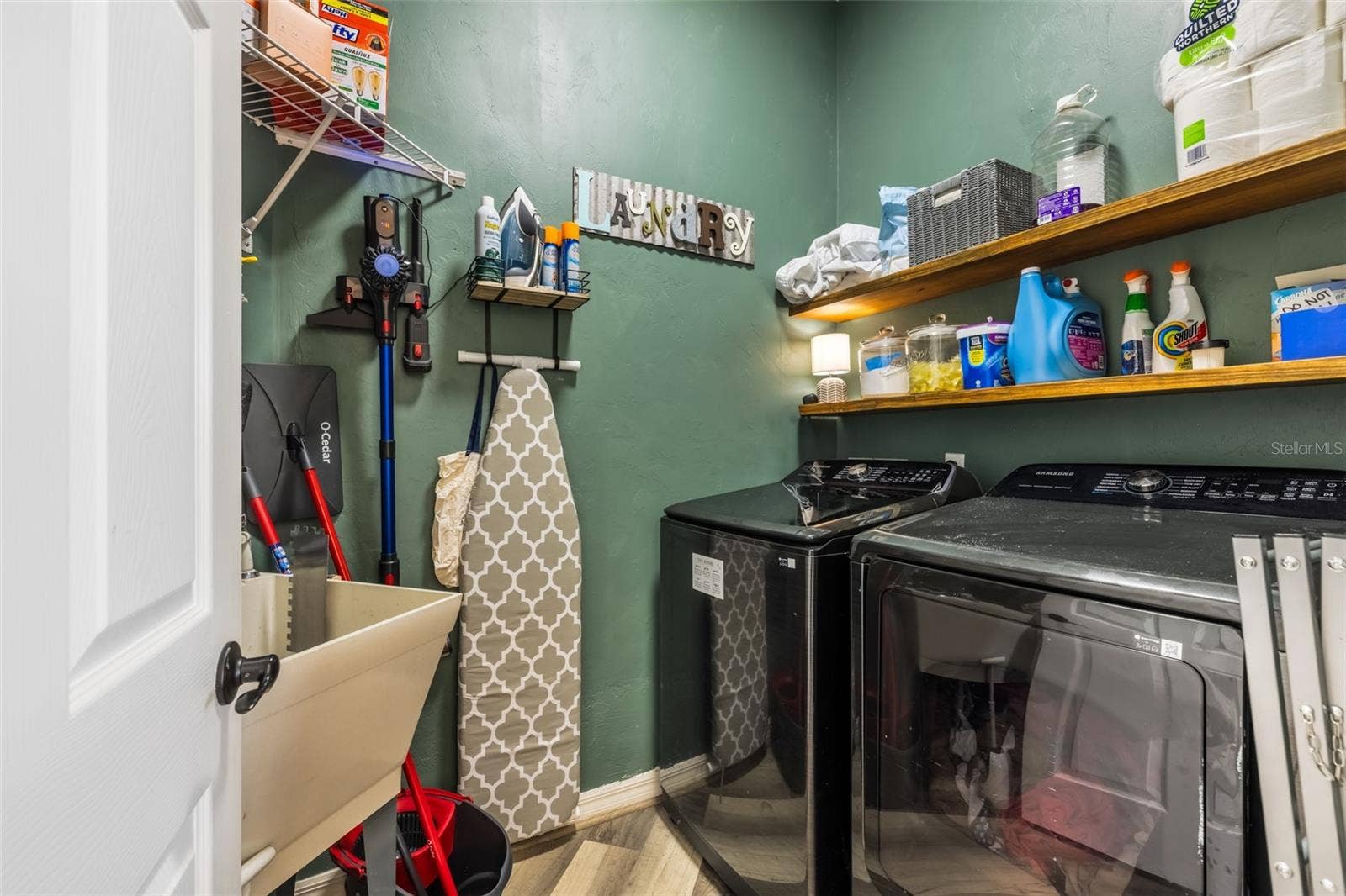 Laundry room with basin