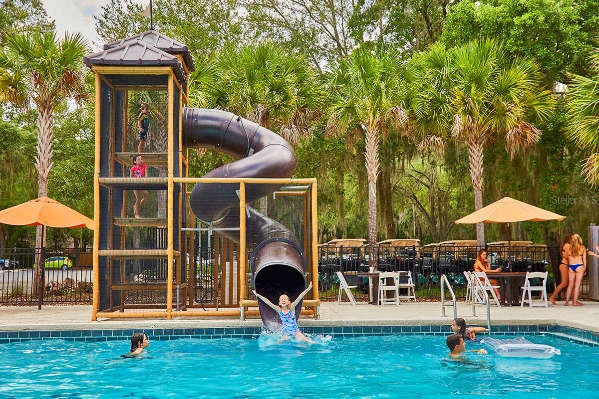 Main pool with cabanas and waterslide