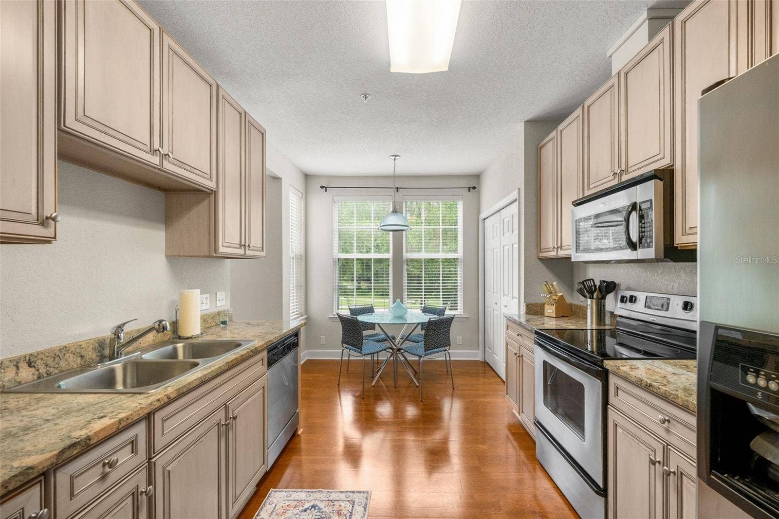 4715 SW 91ST DRIVE, #201, Gainesville, FL 32608 Kitchen with dining area