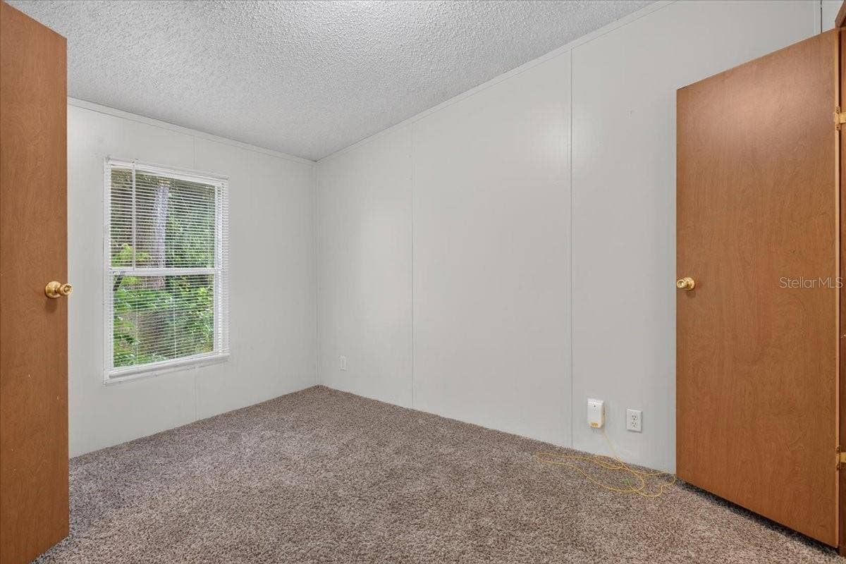 7030 NW 167TH PLACE, Trenton, FL 32693 Guest bedroom with a huge closet too!
