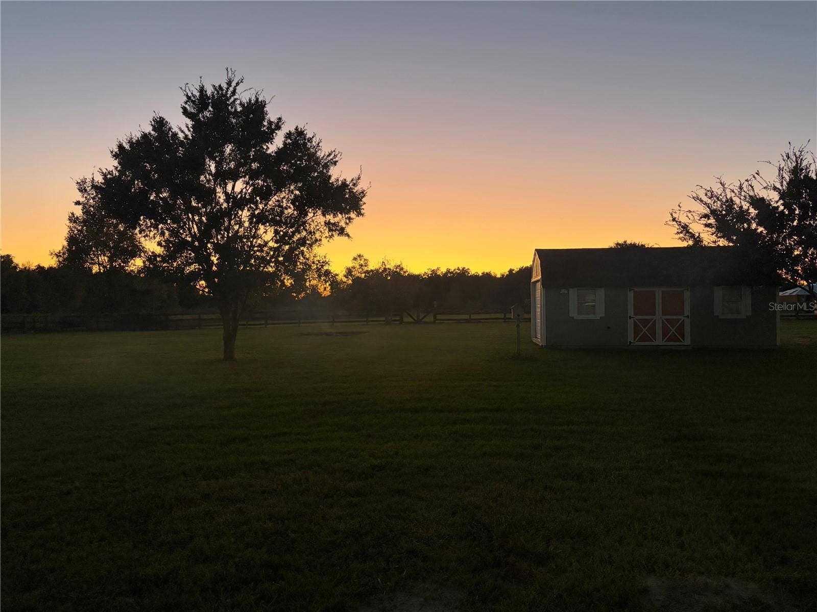 9574 SW 102ND TERRACE, Gainesville, FL 32608 Sunset from back screened in porch