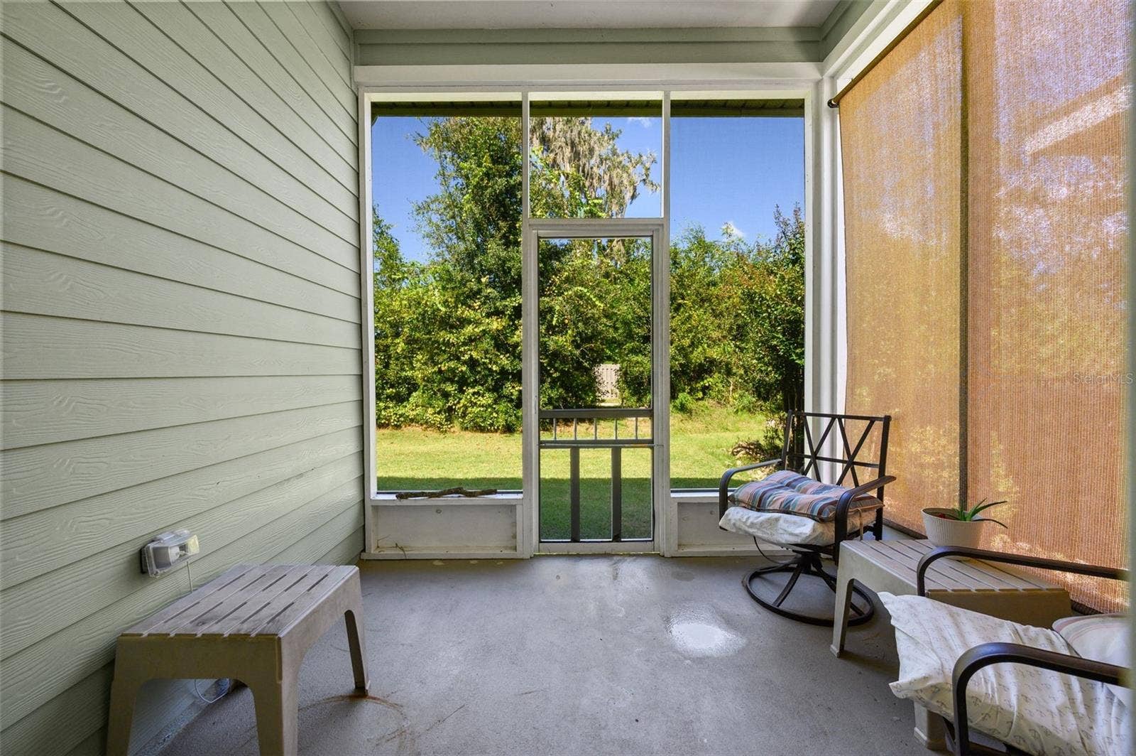 1402 NW 132ND BOULEVARD, Newberry, FL 32669 Screened Back Lanai