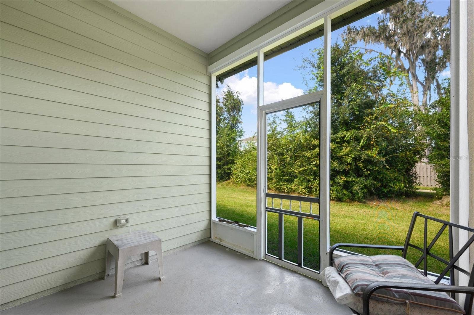 1402 NW 132ND BOULEVARD, Newberry, FL 32669 Screened Back Lanai