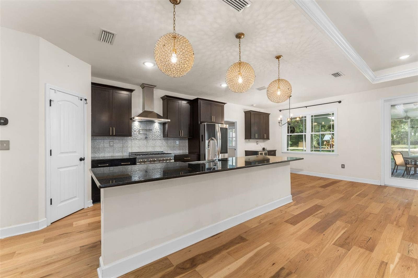 8499 NE 8TH PLACE, High Springs, FL 32643 Oversized Island with Bar seating