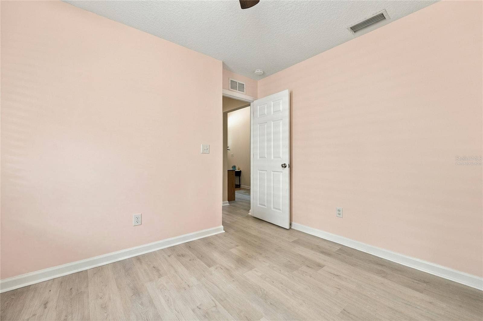 8114 NW 52ND STREET, Gainesville, FL 32653 Virtually staged. Furniture and packing boxes digitally removed.