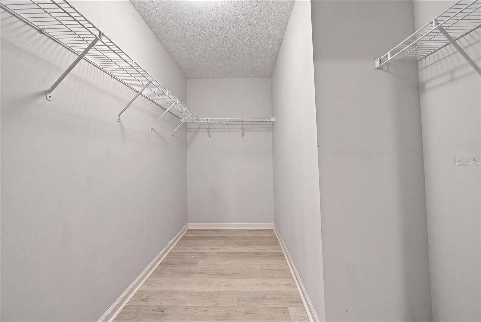8114 NW 52ND STREET, Gainesville, FL 32653 Virtually staged. Clothing and personal belongings digitally removed.