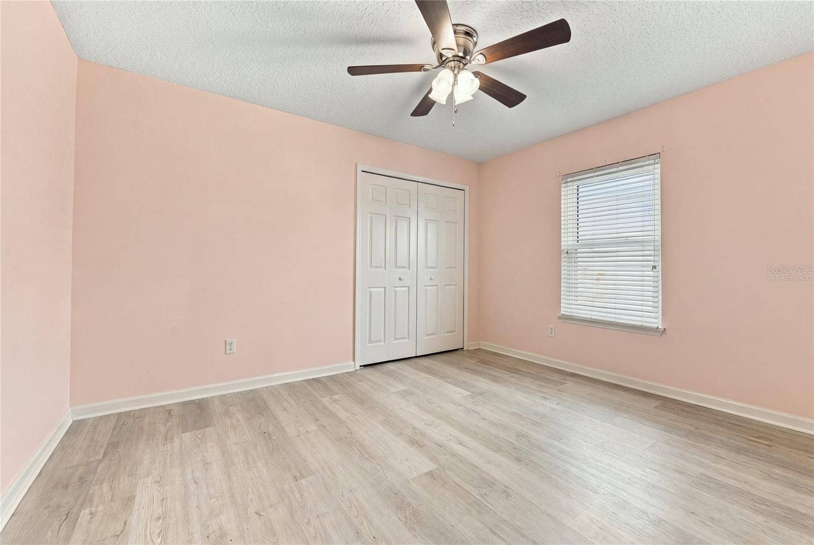 8114 NW 52ND STREET, Gainesville, FL 32653 Virtually staged. Furniture and packing boxes digitally removed.
