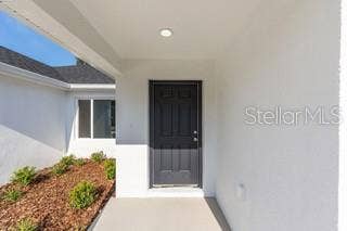 14421 SW 77TH AVENUE, Ocala, FL 34473 Front Porch