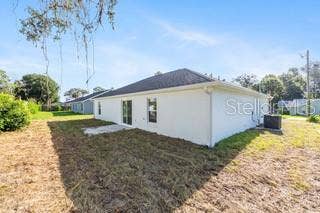 14421 SW 77TH AVENUE, Ocala, FL 34473 Rear Exterior