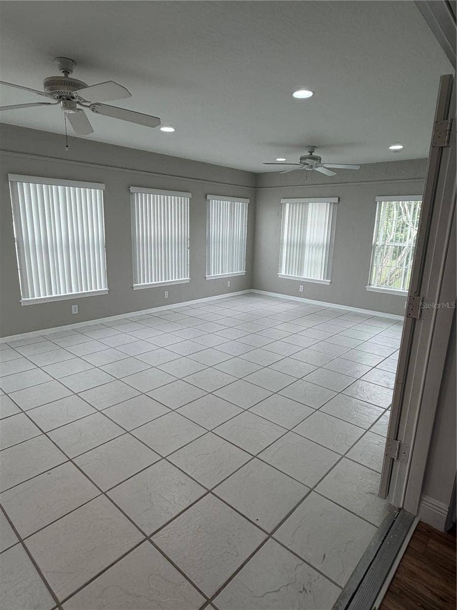 1019 GARDENIA STREET, Sebastian, FL 32958 French Doors off Dining Area to Florida Room