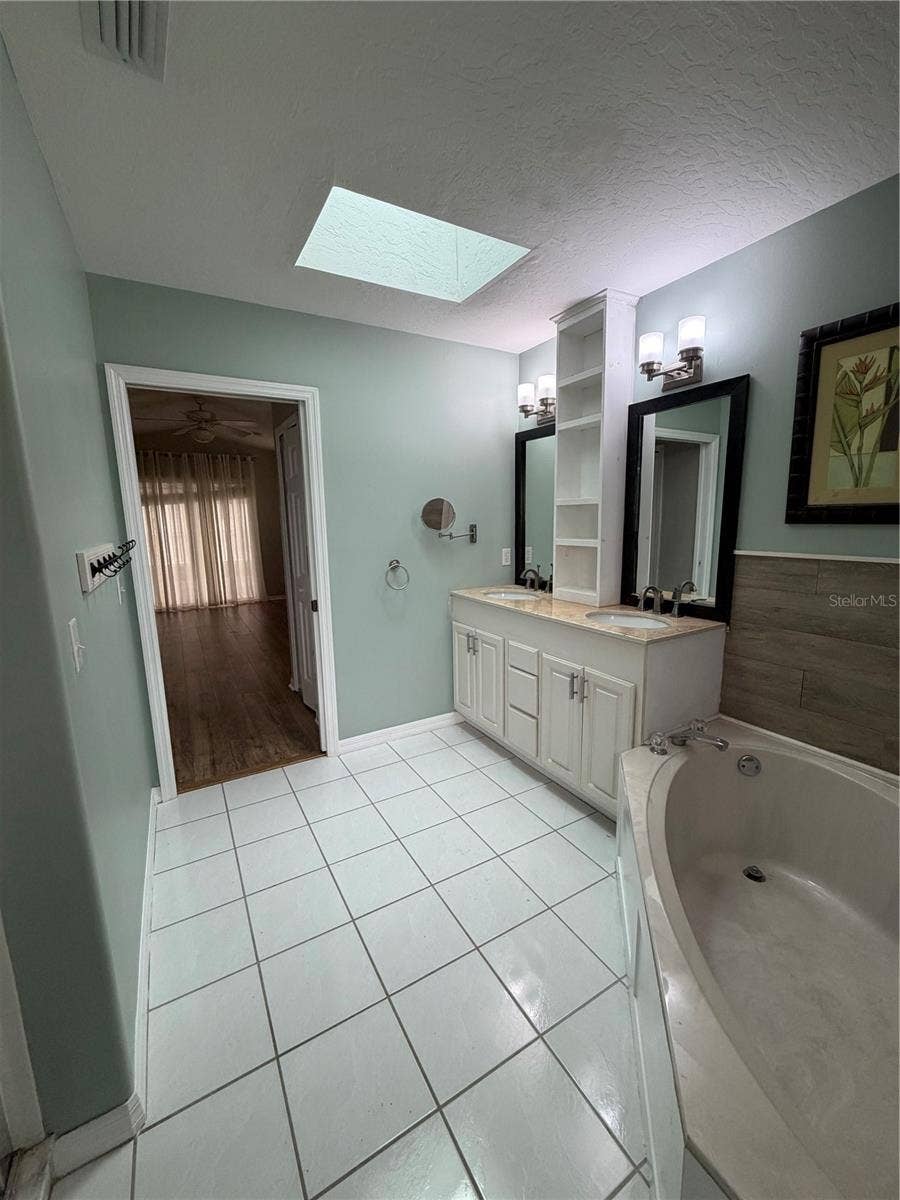 1019 GARDENIA STREET, Sebastian, FL 32958 Master Bath with tub & shower