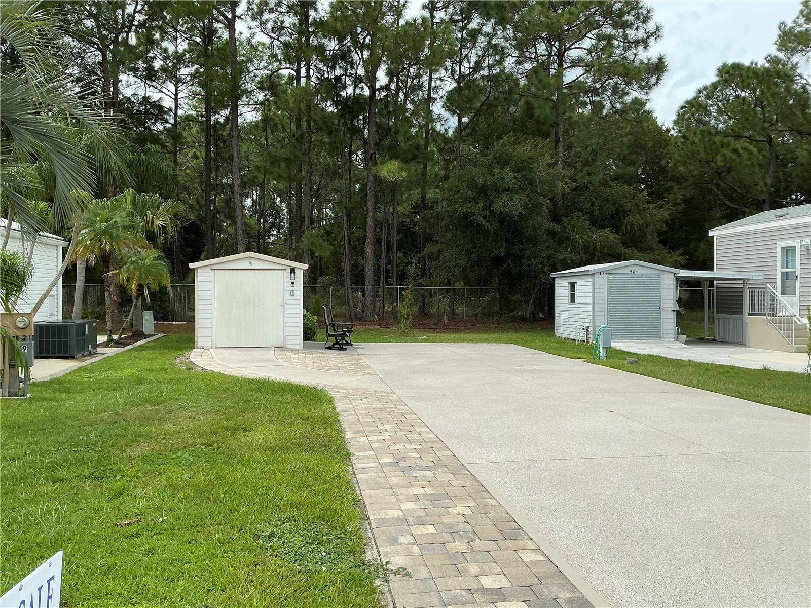 427 PINE LOOP, Frostproof, FL 33843 Paving bricks next to the drive.