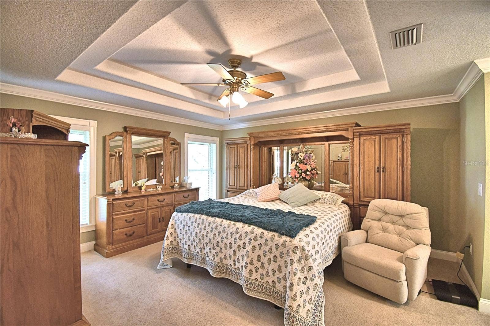 2391 S LAKE REEDY BOULEVARD, Frostproof, FL 33843 Master bedroom with tray ceilings and lake view