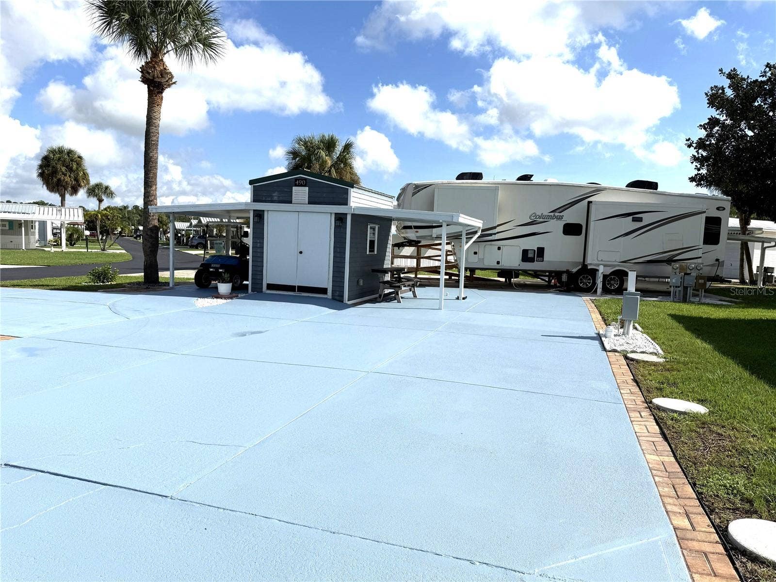 490 PINE LOOP, Frostproof, FL 33843 RV CORNER LOT-MUCH TO OFFER!