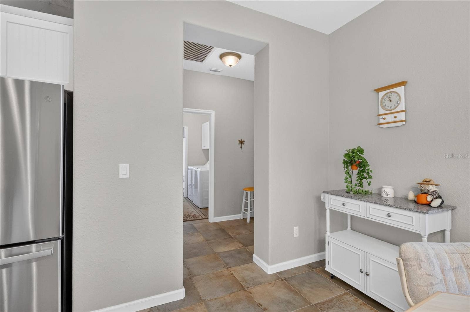 Hall to Garage and 3rd Bathroom and Laundry
