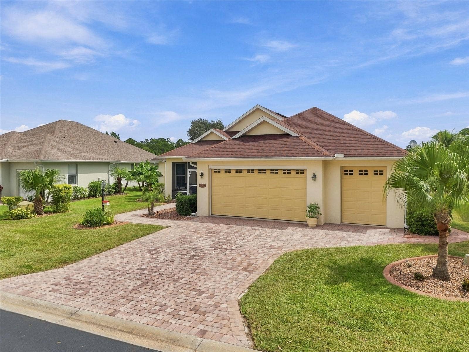 Two car garage plus golf cart garage