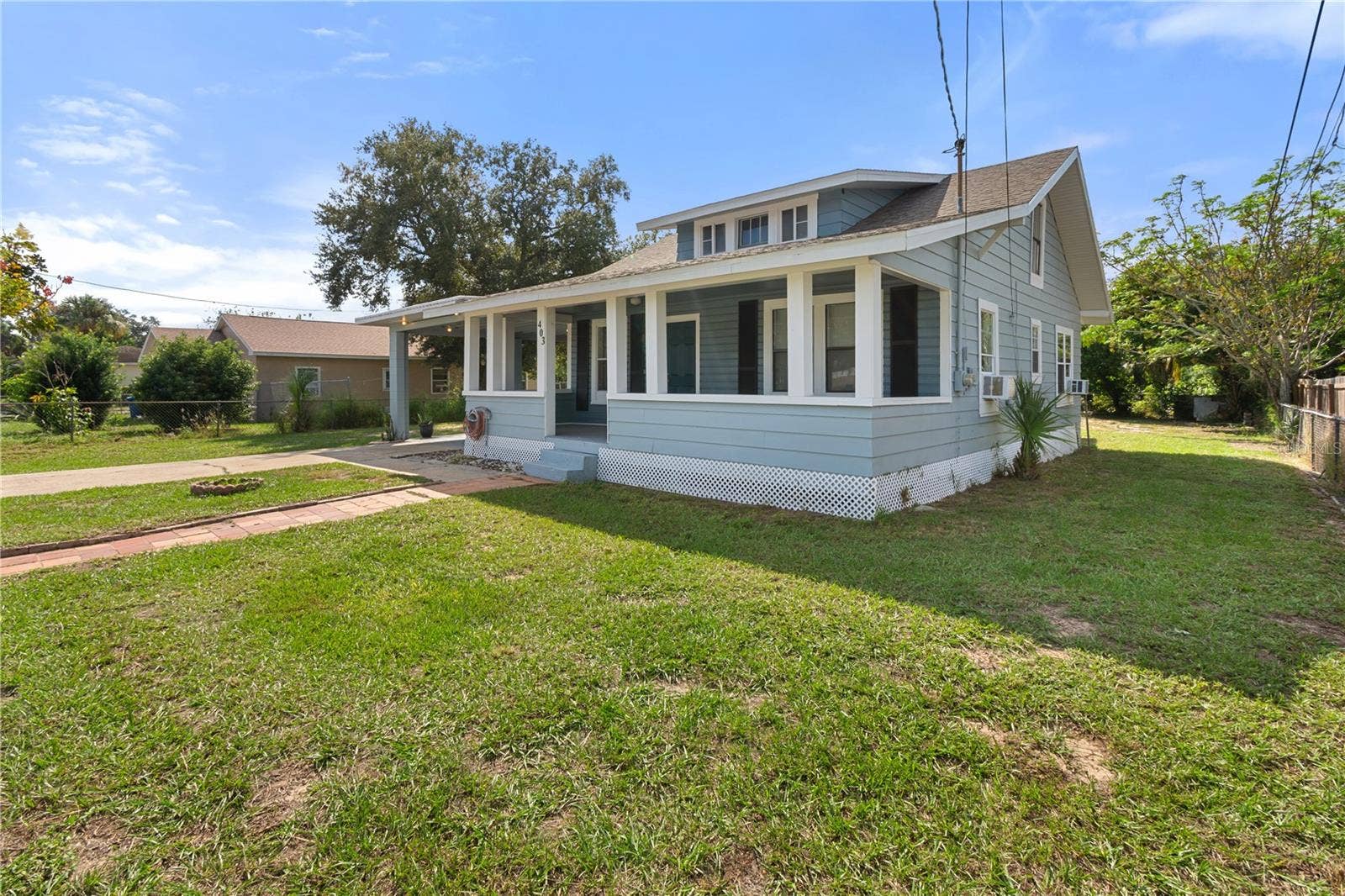 403 N WETMORE STREET, Lake Wales, FL 33853 Corner front view