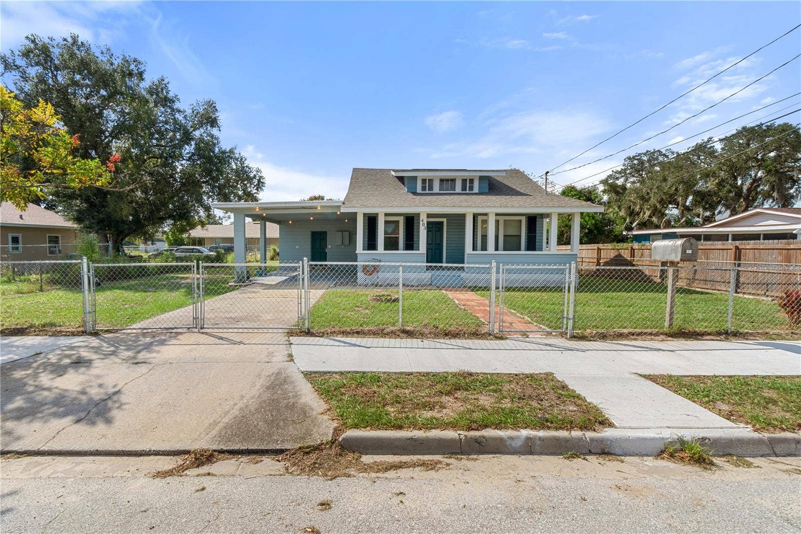 403 N WETMORE STREET, Lake Wales, FL 33853 View from Sidewalk