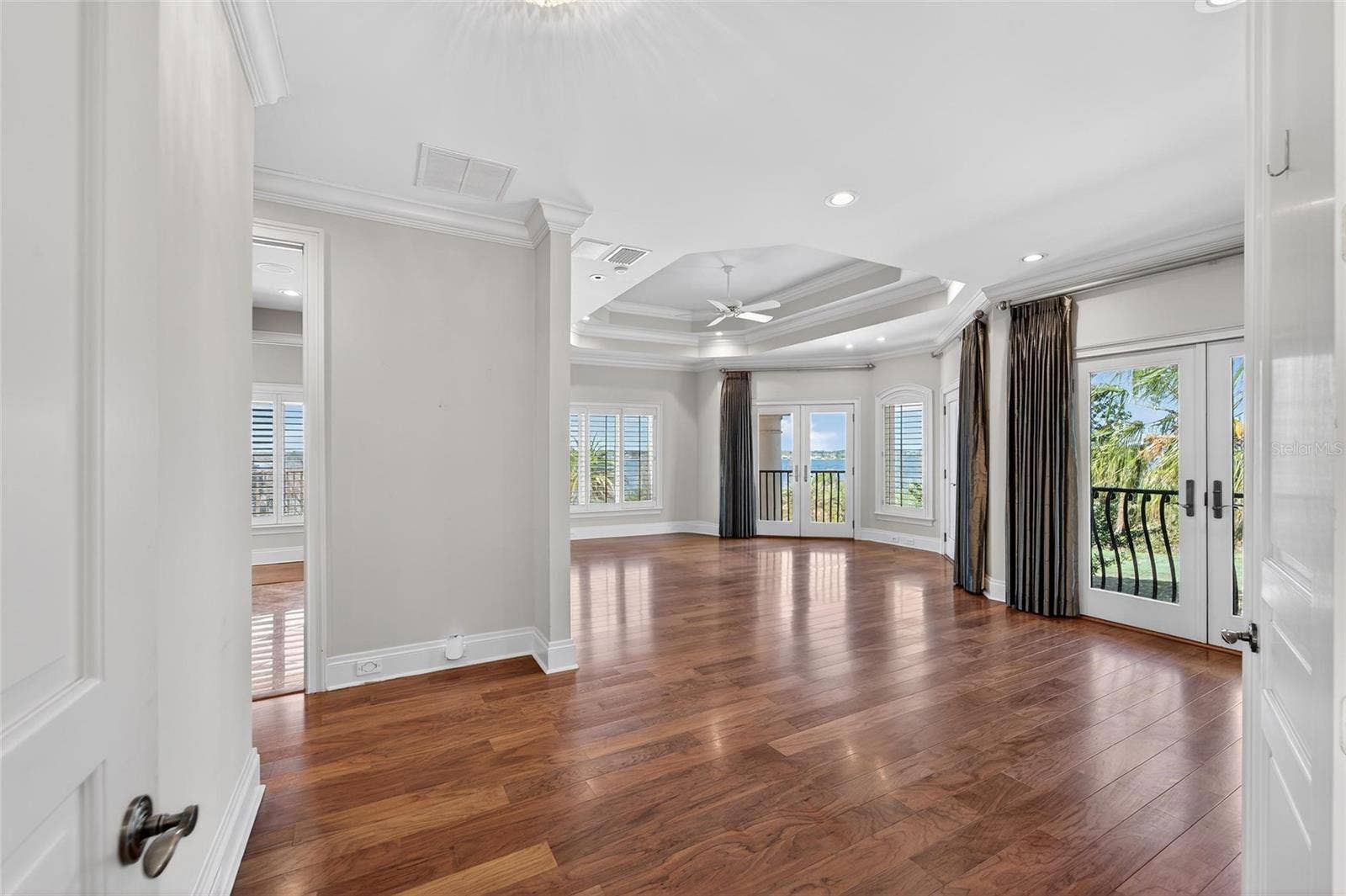 501 ADAMS BARN ROAD, Auburndale, FL 33823 Upstairs Primary Suite showing balconies
