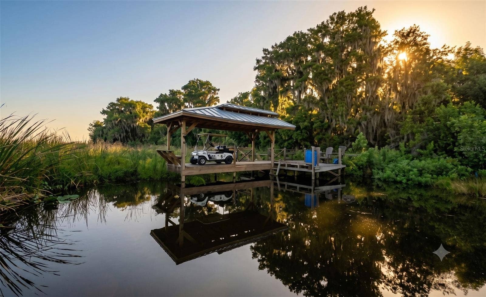 7950 BANNON FISH CAMP ROAD, Haines City, FL 33844 COVERED DOCK WITH MOORING LINES, SEATING AND GOLF CART PARKING