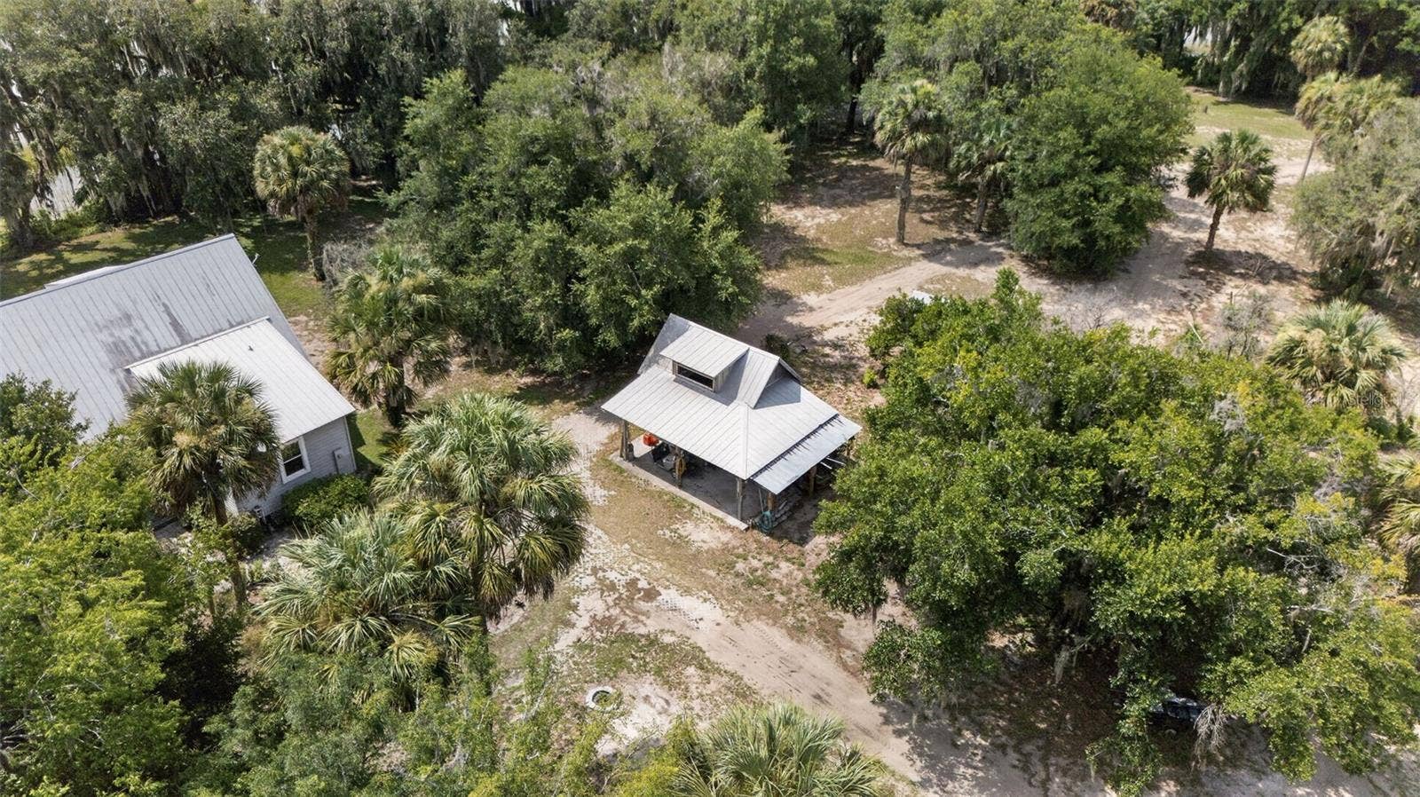 7950 BANNON FISH CAMP ROAD, Haines City, FL 33844 AERIAL OF THE DOG TROT DUPLEX AND SHED BANNON ISLAND L4961212