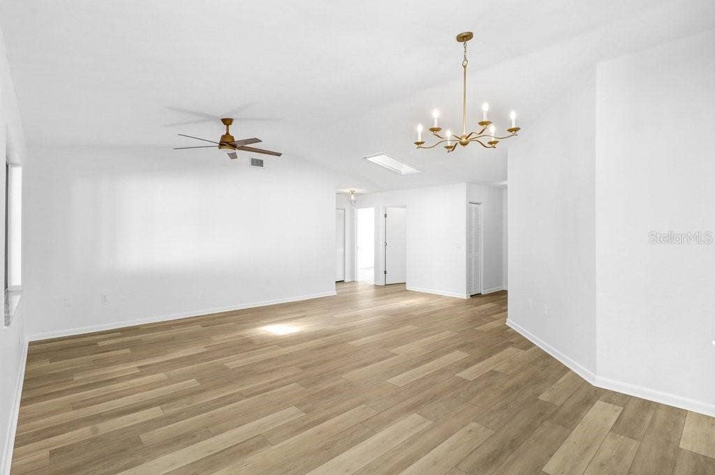 View from Kitchen/Dinette to living Dining room and hall leading to bedrooms.