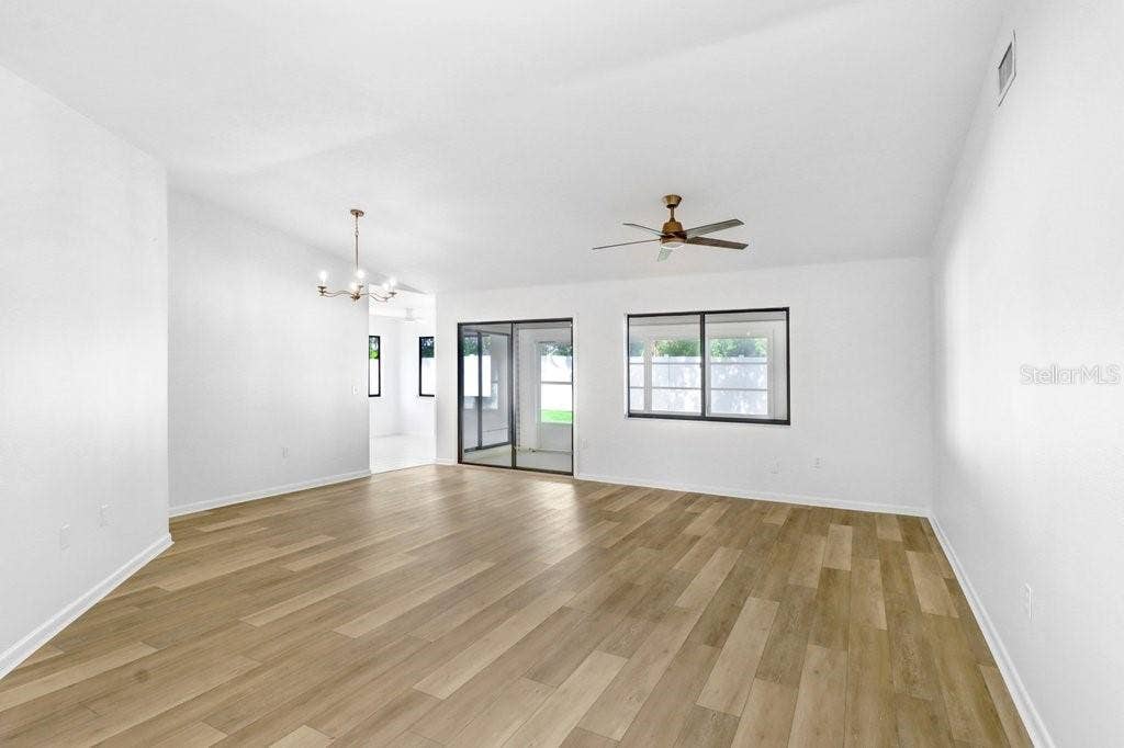 View from front door to Living Dining Room, Dinette and Kitchen to the left.