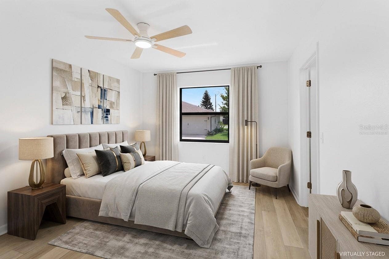 Virtually Staged.  Second Bedroom. Bathroom connect to the right. Large Walk in closet to the left