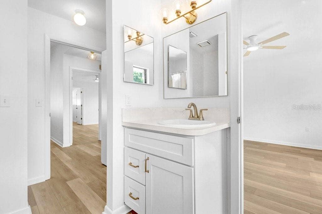 Jack and Jill Bathroom with shower tub combo and linen closet is directly accessible from the Hall and the second bedroom.
