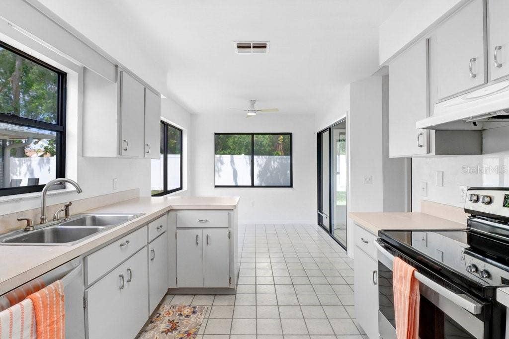 Entering from the Garage, Kitchen and Dinette.