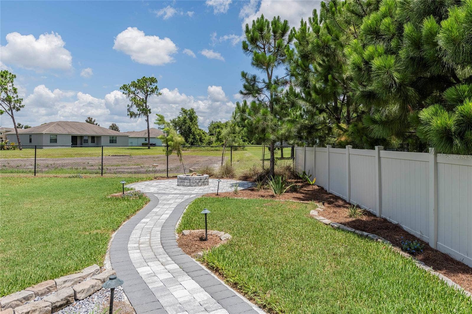 6545 EMERALD WOODS LANE, Lakeland, FL 33813 Walkway to Fire Pit