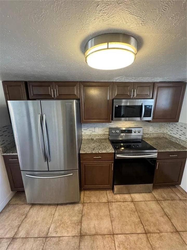 1836 WARRINGWOOD DRIVE, #B4, Orlando, FL 32839