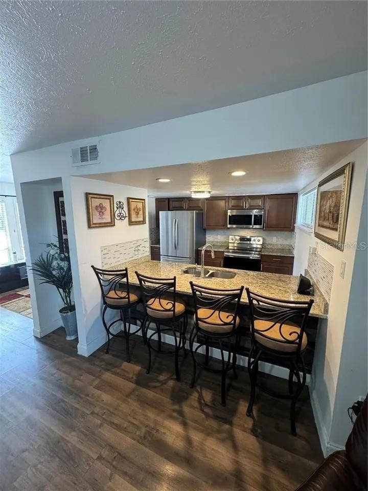 1836 WARRINGWOOD DRIVE, #B4, Orlando, FL 32839