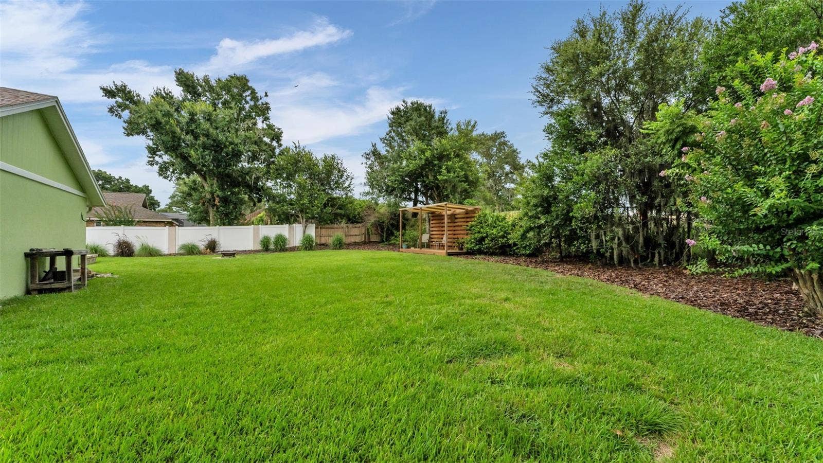 expansive fenced backyard