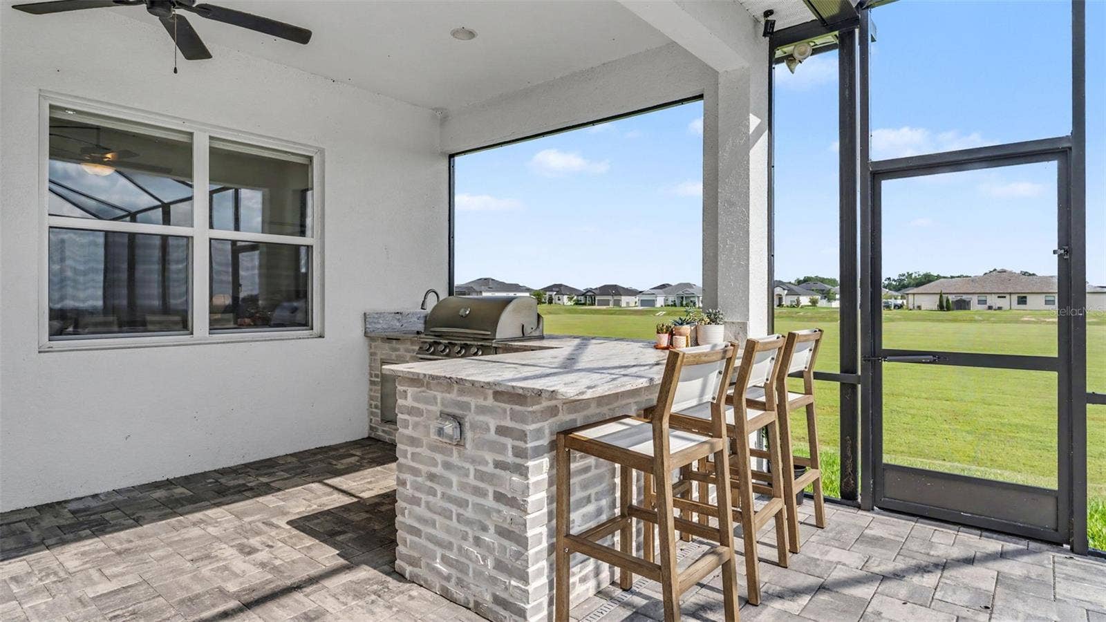 7034 BENTRIDGE DRIVE, Lakeland, FL 33813 Outdoor Kitchen with Grill