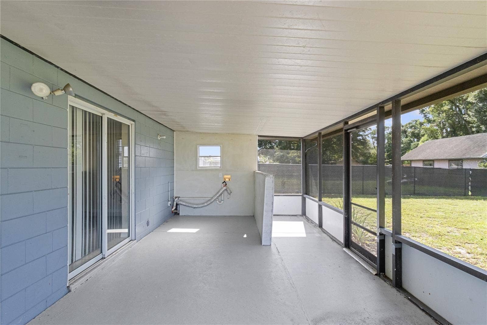 288 CHERRY LAUREL LANE, Winter Haven, FL 33880 Back Porch w Laundry Hook up